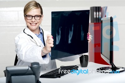 Senior Doctor Holding X Ray Stock Photo