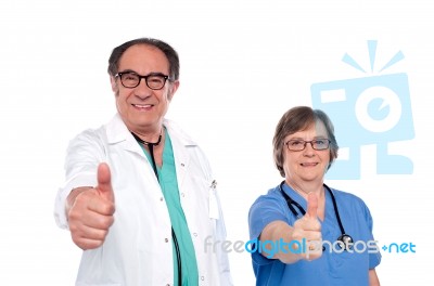 Senior Doctors Showing Thumbs Up Stock Photo