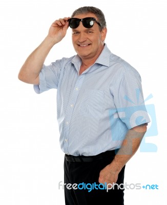 Senior Male Wearing Sunglasses Stock Photo
