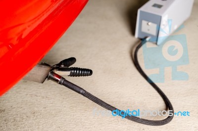 Sensor Device Measuring Exhausts Of A Car In Garage Stock Photo