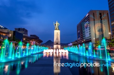 Seoul, South Korea - April 30, 2016:beautifully Color Water Fountain At Gwanghwamun Plaza With The Statue Of The Admiral Yi Sun-sin In Downtown.photo Taken On April 30,2016 In Seoul,south Korea Stock Photo