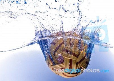 Sepak Takraw Ball In Water Stock Photo