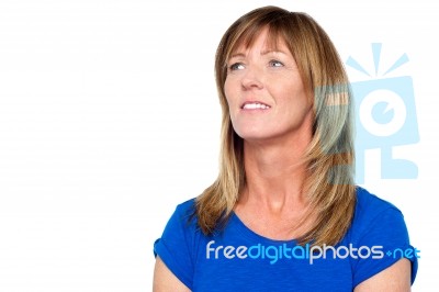 Serious Faced Woman Lady Looking Up And Away Stock Photo