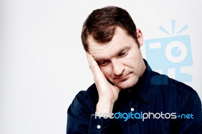 Serious Man Thinking About Something Stock Photo