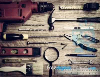 Set Of Tools Over A Wood Background Stock Photo