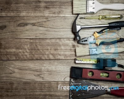 Set Of Tools Over A Wood Background Stock Photo