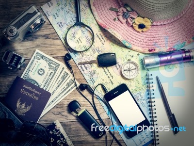 Set Of Travel Accessory On Wooden Background Stock Photo
