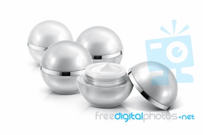 Several Silver Sphere Cosmetic Jar On White Background Stock Photo