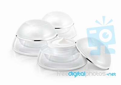 Several White Rounded Cosmetic Jar On White Background Stock Photo
