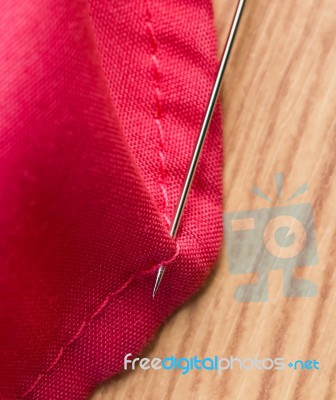 Sewing Cloth Represents Sewer Tailor And Embroider Stock Photo