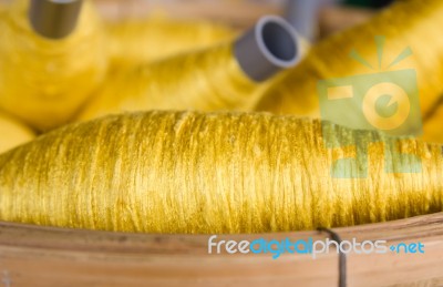 Sewing Threads Golden Color Stock Photo