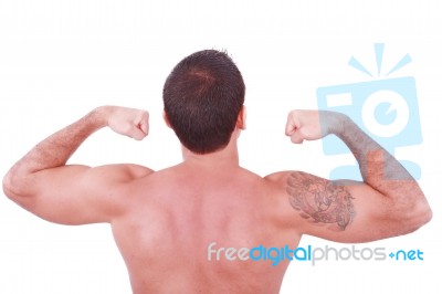 Sexy Man Showing His Biceps Stock Photo