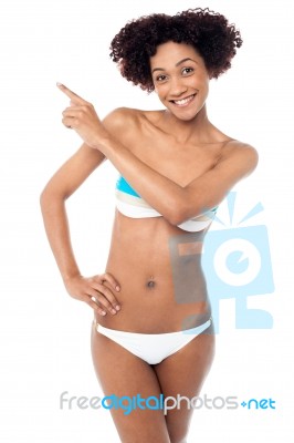 Sexy Woman With Curvy Body Pointing Sideways Stock Photo