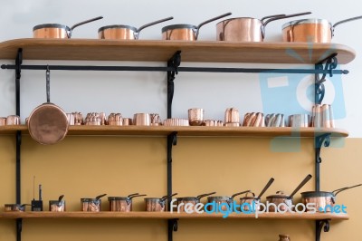 Shelves Full With Copper Saucepans Stock Photo
