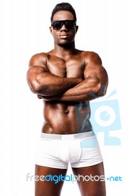 Shirtless Strong Man With Crossed Arms Stock Photo