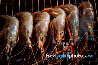 Shrimp Grilled On Barbeque Charcoal Stove Stock Photo