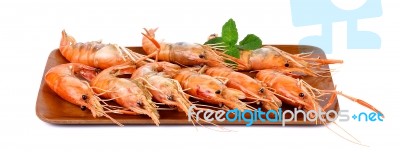 Shrimps With Mint Leaves On The Wooden Board Stock Photo
