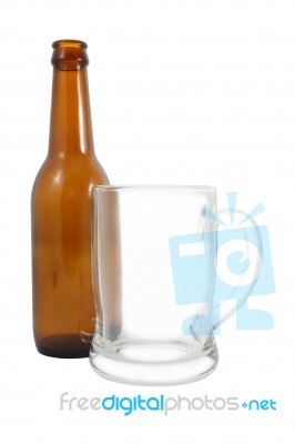 Side Of Bottle And Glass On White Background Stock Photo
