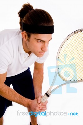 Side Pose Of Male Playing Tennis Stock Photo