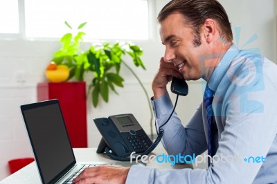 Side Profile Of A Businessman Busy In Office Work Stock Photo