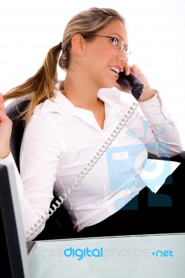 Side View Of Businesswoman Talking On Phone Stock Photo