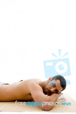 Side View Of Man Lying At Spa Stock Photo