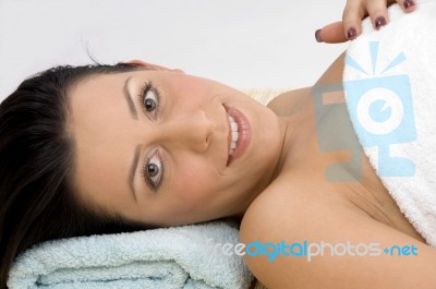 Side View Of Relaxing Female Stock Photo