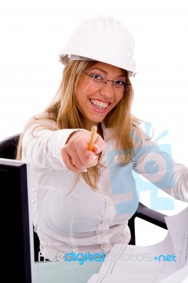 Side View Of Smiling Architect With Blue Print Stock Photo
