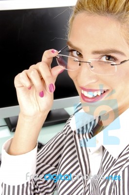 Side View Of Smiling Businesswoman Stock Photo