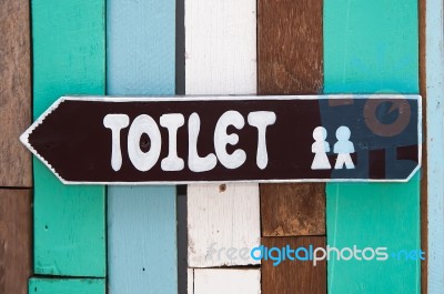 Sign Restroom Of  Men And Women On Wood Background Stock Photo