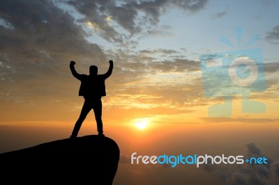Silhouette Achievements Successful Man Is On Top Of Hill Celebra… Stock Photo