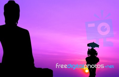 Silhouette Elephant With Tourist In Front Of Big Buddha At Sunse… Stock Photo
