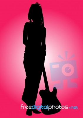 Silhouette female guitarist Stock Image