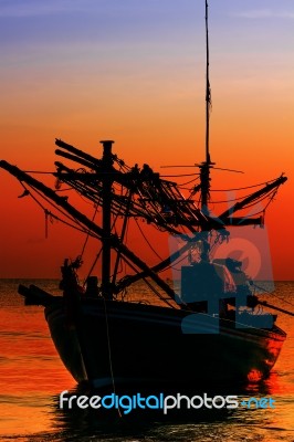 Silhouette  Fishing Boat Stock Photo