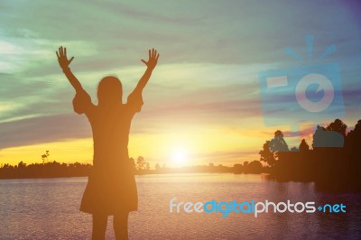 Silhouette Of Woman Praying Over Beautiful Sky Background Stock Photo Silhouette Of Woman Praying Over Beautiful Sky Background Stock Photo