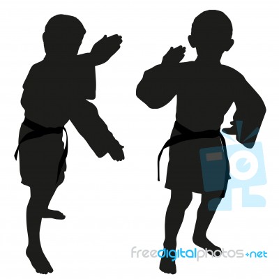 Silhouettes Of Two Little Boys Stock Photo