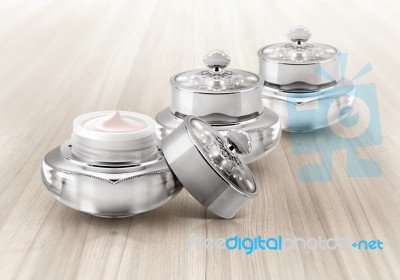 Silver Deluxe Cosmetic Jar On Wood Background Stock Photo