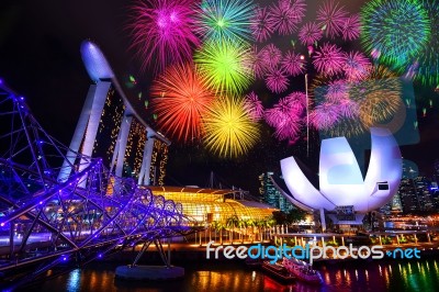 Singapore Cityscape And Firework At Night In Singapore Stock Photo