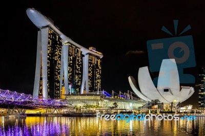 Singapore Skyline Illuminated At Night Stock Photo
