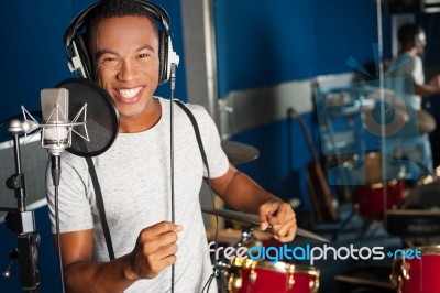 Singer Recording His New Track In Studio Stock Photo