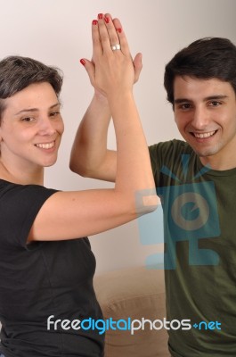 Sister And Brother High Five Stock Photo