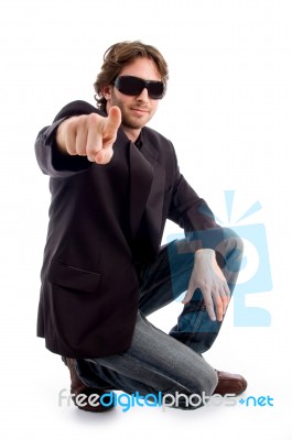 Sitting Man Pointing Out Stock Photo