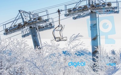 Ski Chair Lift Is Covered By Snow In Winter, Korea Stock Photo