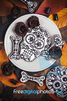 Skull Cookies With Liquorice Flowers For Halloween Stock Photo