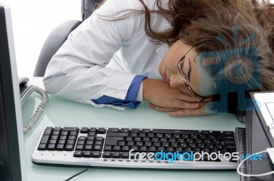 Sleeping Young Doctor Stock Photo