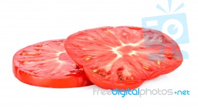 Slice Of Tomato Isolated On White Background Stock Photo