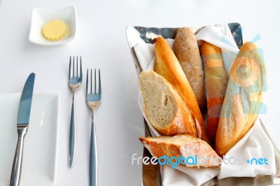 Sliced Baguette With Butter  Stock Photo
