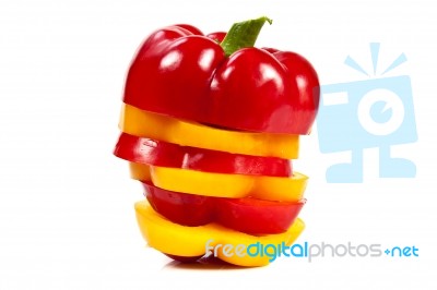 Sliced Red And Yellow Bell Peppers Stock Photo