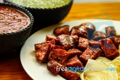 Sliced Sausage With Sauces Stock Photo