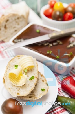 Slices Of Bread And Butter With Tomatoes, Peppers And Pate Stock Photo